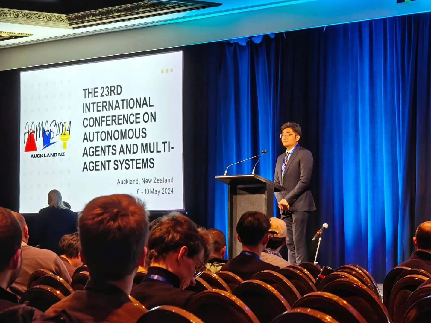 Jiamou Liu gives remarks at the opening of AAMAS 2024.